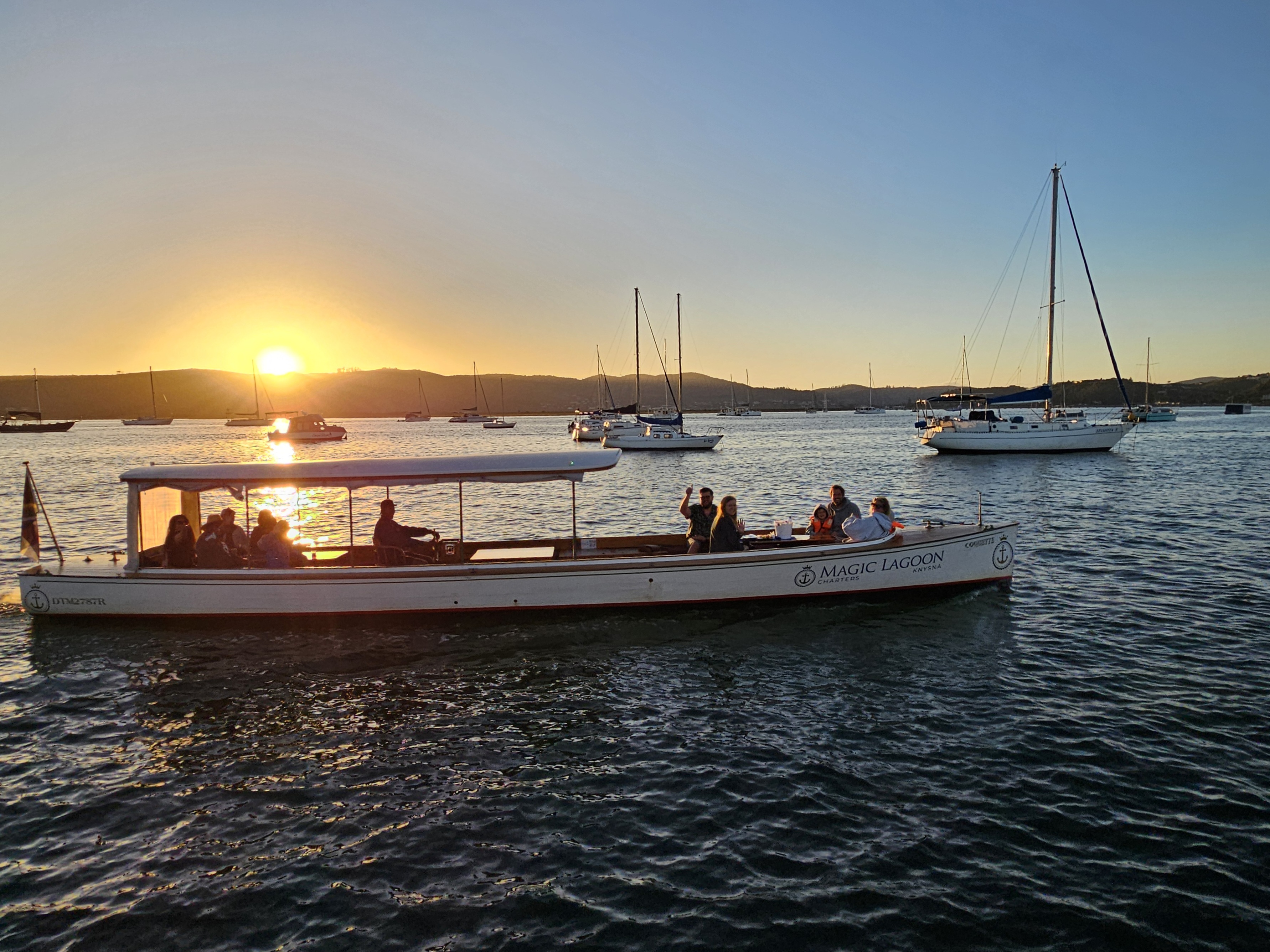 Stunning sunset view over the Knysna Lagoon from aboard the cruise boat